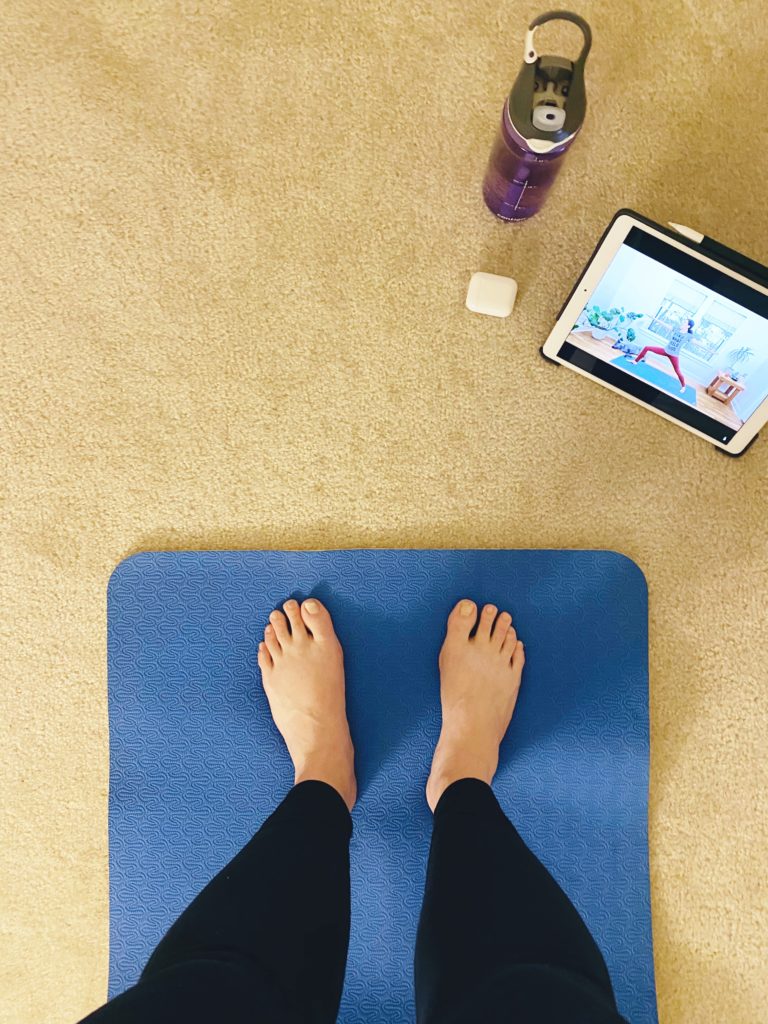 photo of feet on yoga mat