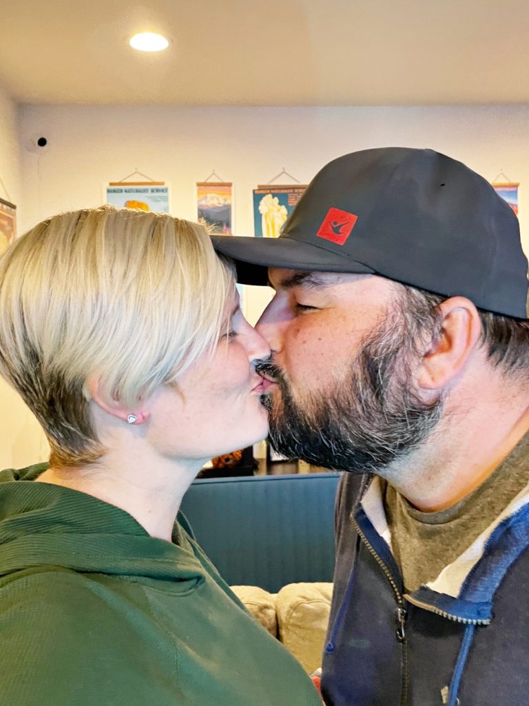 Author kissing her husband